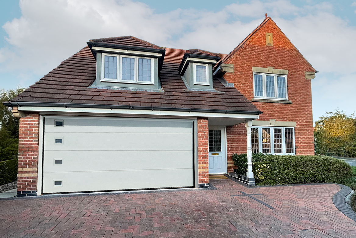 TS 2023 GARAGE DOOR WHITE WOODGRAIN EMBOSSED RAL9010 WEB ROOMSET SECTIONAL