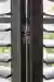 small metal hinge on the Tebbutts grey shutters